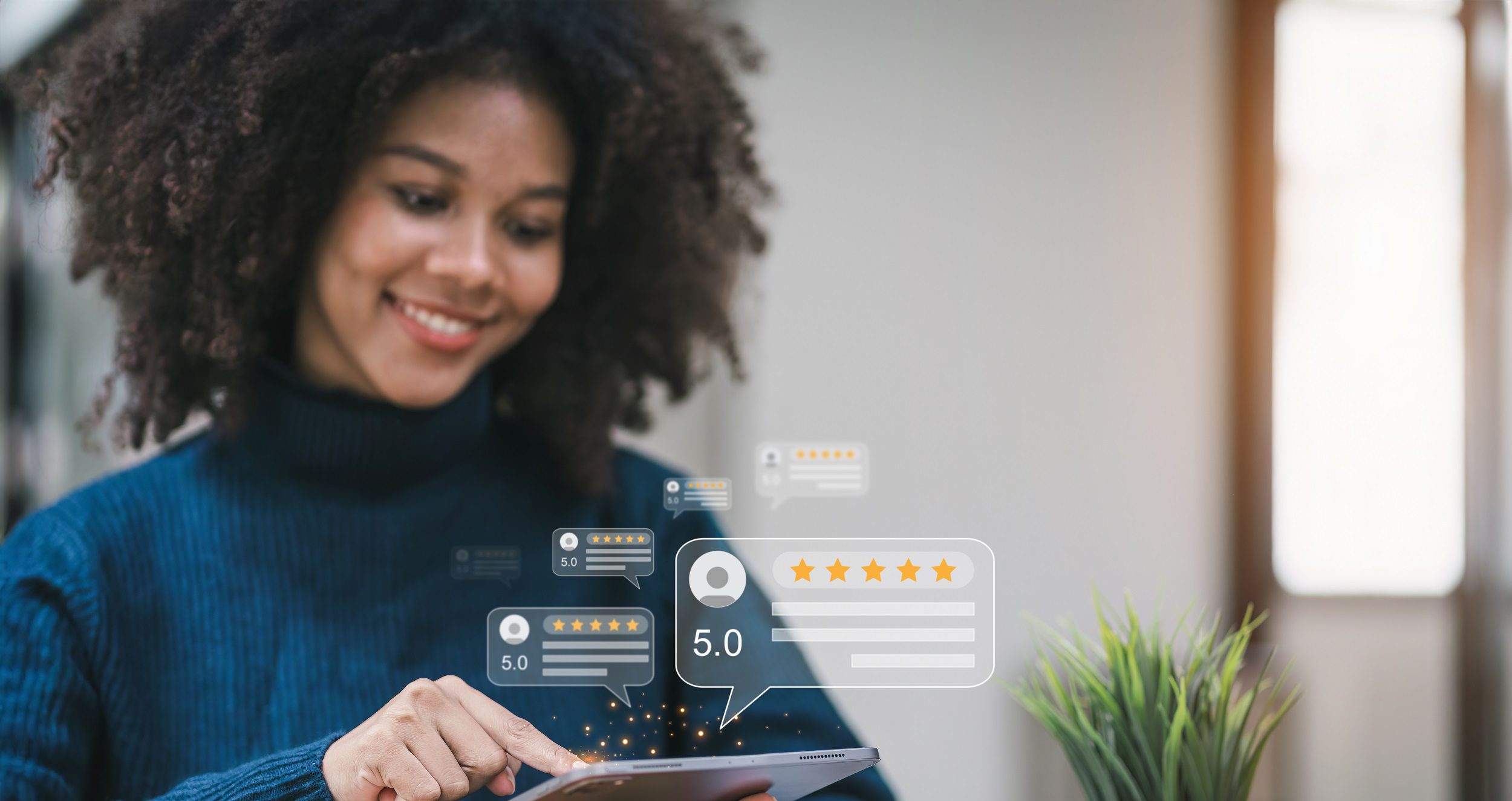 Woman smiling, looking at her tablet. Illustrations show five-star reviews.